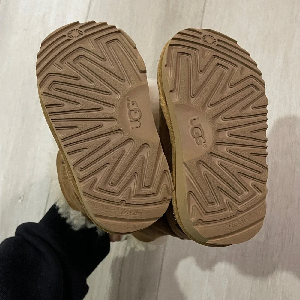 UGG Tan Shearling Boots with Pom Poms
